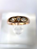 An Edwardian 9 ct rose gold gypsy ring set with 3 diamonds, 4.5gm, size N