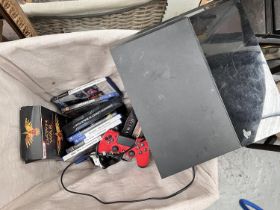 A PS4 and a collection of PS2 and later games