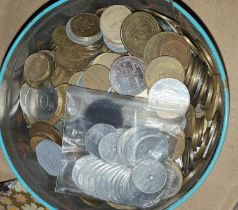 A bulk quantity of gaming machine and transport tokens, 2.3kg