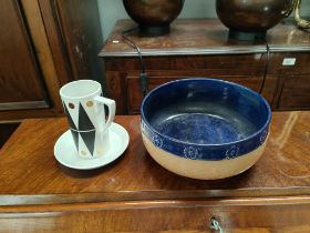 A Royal Doulton Stoneware bowl and a tall Portmeirion cup and saucer