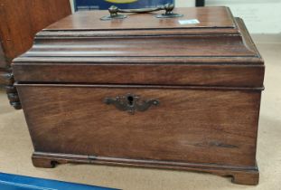 A 19th century mahogany casket shaped box
