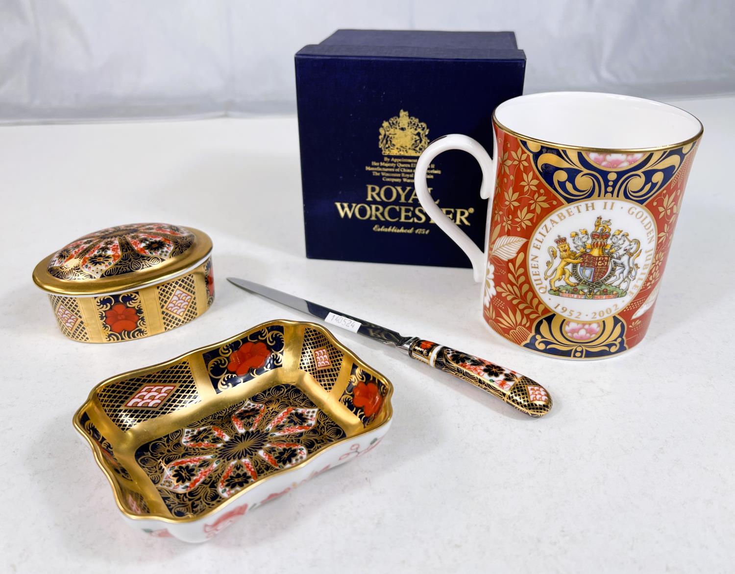 A Royal Crown Derby Japan pattern commemorative mug QEII Golden Jubilee; an oval Royal Crown Derby