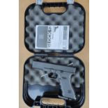 A modern Glock 17 air pistol in case with instructions