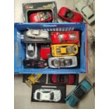 A collection of 1/18 approx. scale models of metal cars by Maisto and others inc. Pontiac etc