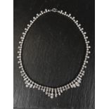 A 1930's diamante necklace with tiered drops