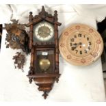 A Vienna wall clock with bamboo style carved decoration chiming movement; A painted metal Japy clock