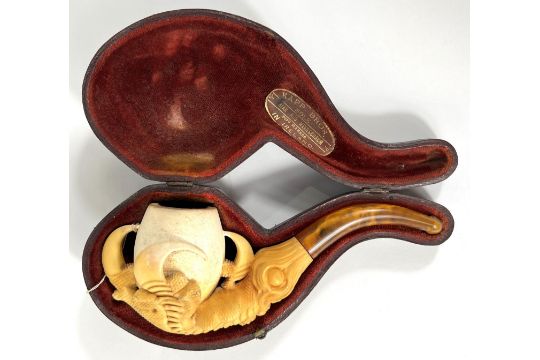 A cased amber and Meerschaum pipe in the form of a claw & egg, length 16cm. - Image 1 of 9