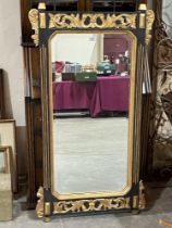 A parcel gilt pier glass with bevelled plate of recent manufacture. 51" high