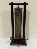 A late 19th century brass trench art shellcase gong on mahogany frame. 21½" high.