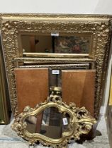 Two gilt framed wall mirrors and triptych dressing table mirror.