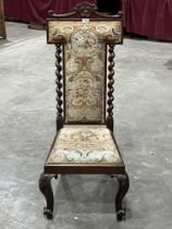 A Victorian mahogany and tapestry side chair, the high back with spiral turned pilasters on volute