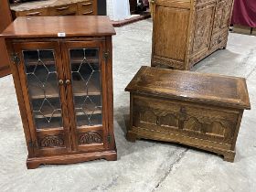 An oak television stand and a hifi cabinet