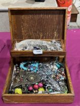 A box of costume jewellery.