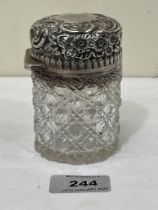 A Victorian hobnail cut jar with silver mount and repousse lid. Birmingham 1892. 3¾" high