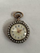 A 19th century keyless lever fob watch, the enamel dial with Arabic numerals, set with split