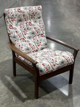 A modernist design Cintique teak armchair. c.1970.