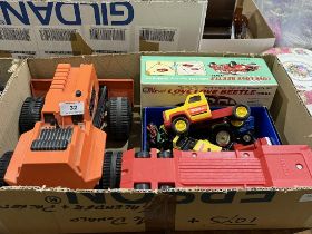 A collection of diecast and other vehicle toys to include a c.1970s boxed Bump and Go Volkswagon