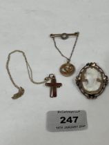 A collection of 9ct jewellery to comprise two cross pendants and chain, 1.3g; a shell cameo