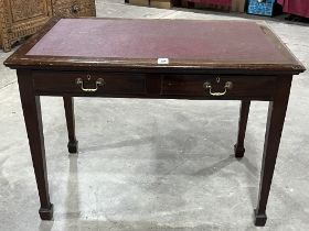 An early 20th Century mahogany writing table with inlet top and two frieze drawers. 42" wide