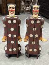 A pair of novelty painted figural cabinets. 39½" high.