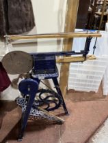 A cast iron 'Hobbies' treadle saw.