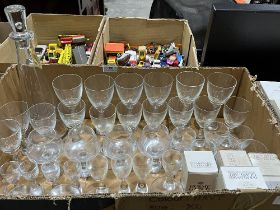A collection of Holmgaard drinking glasses and decanter with 17 original boxes