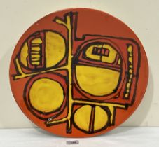 A Poole Pottery Delphis charger, shape 54; decorated by Carol Cutler. 16" diam.
