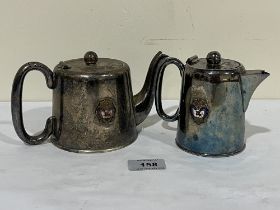 A plated masonic teapot and hot water jug.