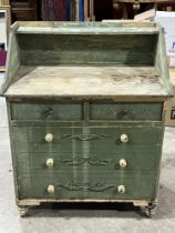 A Victorian decorated pine chest of two short over one long deep drawer, on turned feet. 31" wide.