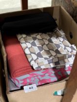 Four boxes of fabric and linen