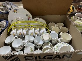 Three boxes of ceramics and glassware.