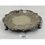 A George III Irish silver waiter, with cast rim and chased decoration of scrolled foliage. Dublin,