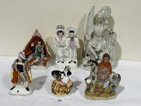 Six 19th Century Staffordshire figures to include two of David Garrick as Richard III. 15" high