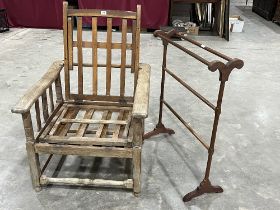 A 1930s oak chair/day bed and a mahogany towel rail