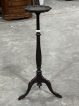 A 19th Century mahogany jardiniere stand with piecrust top in tripod support. 35" high.