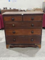A 19th Century mahogany chest of drawers. 43" wide. Distressed.