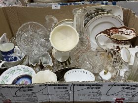 A box of ceramics and glassware.