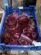 A box of cranberry and ruby glassware.