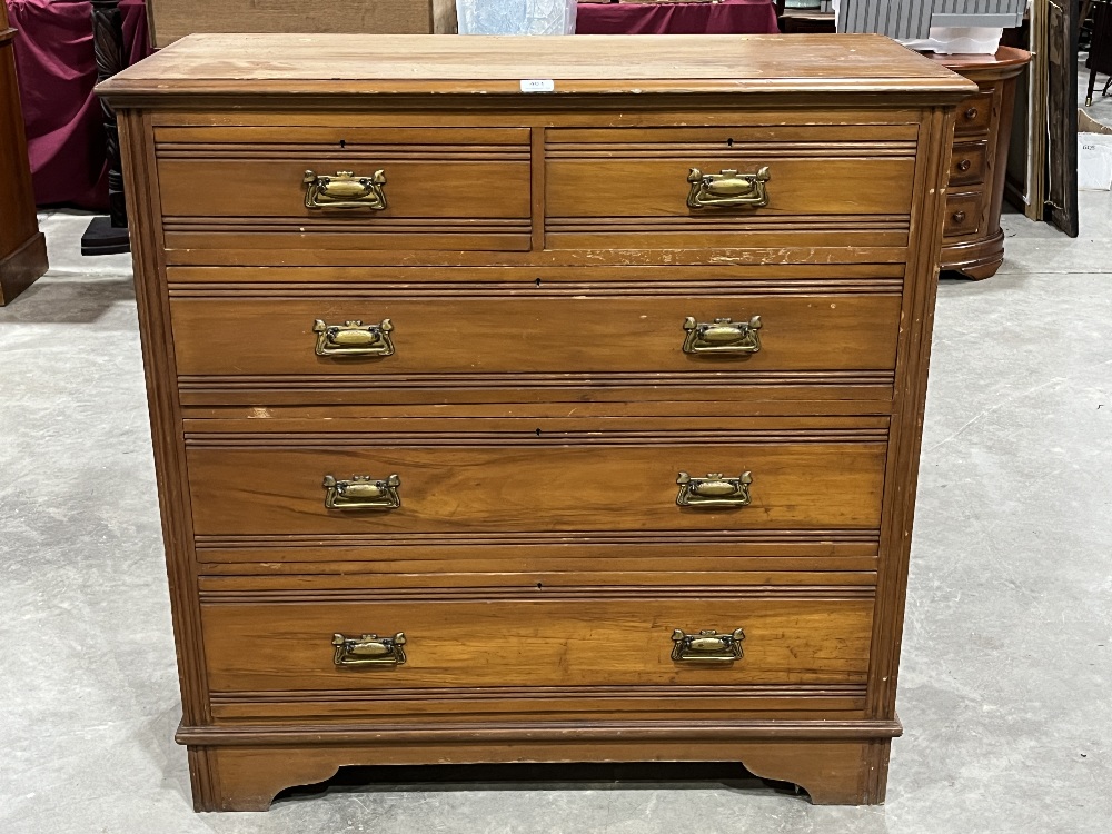 A late Victorian satin pine chest of channel moulded drawers. 42" wide. Hardboard back.