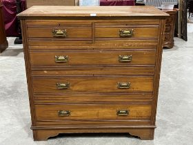 A late Victorian satin pine chest of channel moulded drawers. 42" wide. Hardboard back.