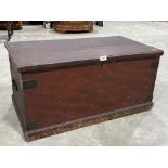 A 19th Century pine chest with brass angles and iron handles, the interior with a till. 34" wide.