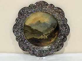 Jennens and Bettridge. A papier mache, lacquer and mother-of-pearl inlaid plate painted with a