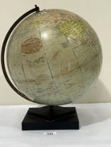 A 12" terrestrial globe by E.J. Arnold and Sons.