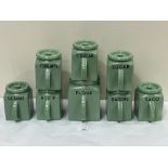 A set of eight Poulton & Co Bristol kitchen ware storage jars and covers. c. 1935