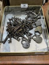A box of keys and padlocks.