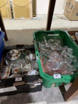 Three boxes of ceramics and glassware.