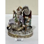 A 19th Century Dresden porcelain group allegorical of winter, the boy sitting on a sledge with a