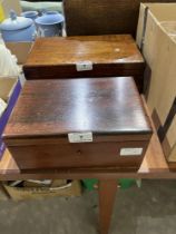 A rosewood box and an oak example.