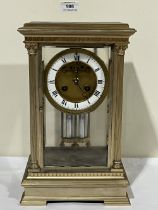 A late 19th Century French gilt brass four glass mantle clock; the drum movement with Brocot