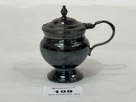 An Elizabeth II silver mustard pot, 3" high. 3ozs 4dwts